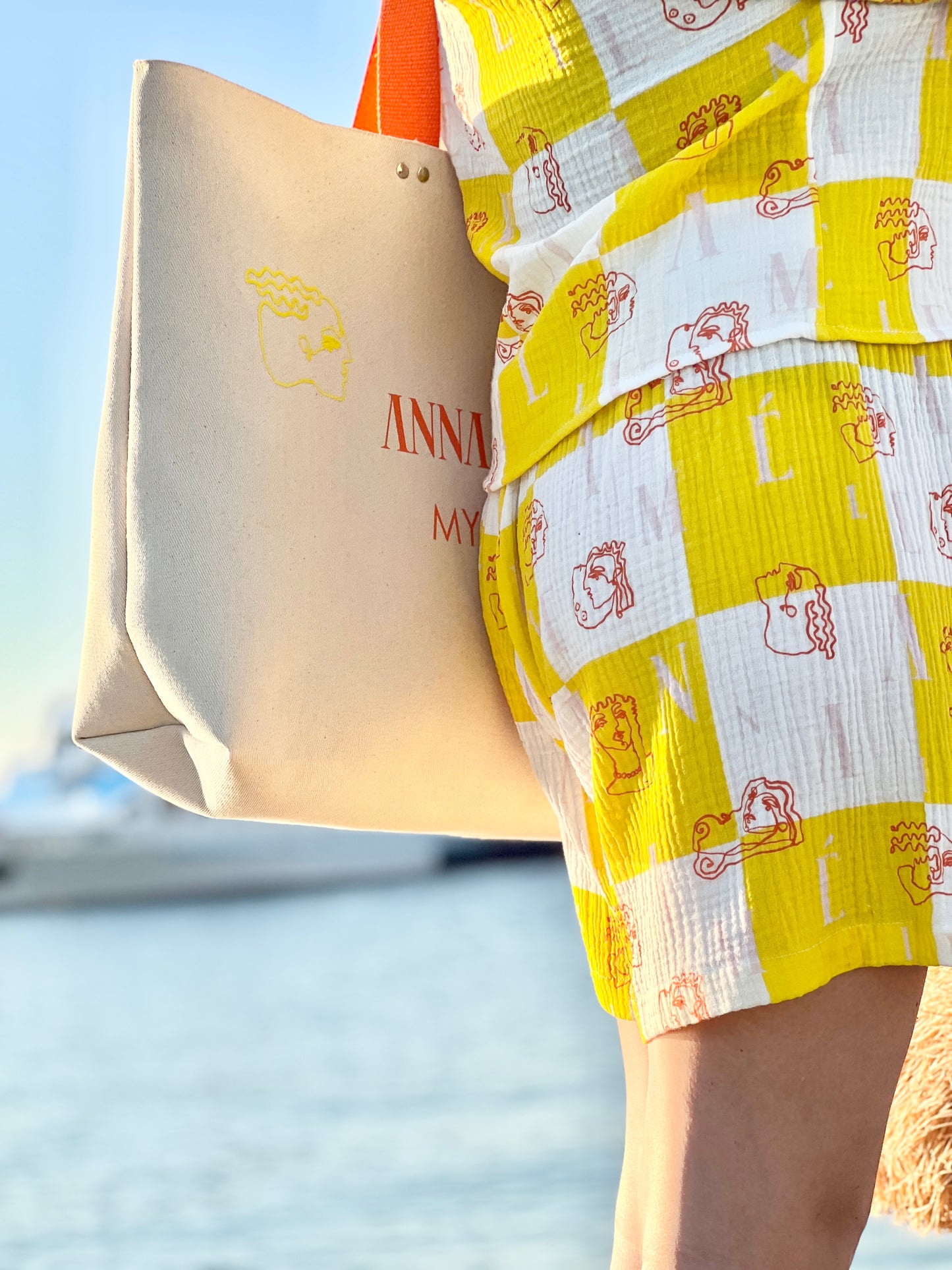 KIMOLOS GAUZE SHORTS - CHECK LOGO PRINT | YELLOW