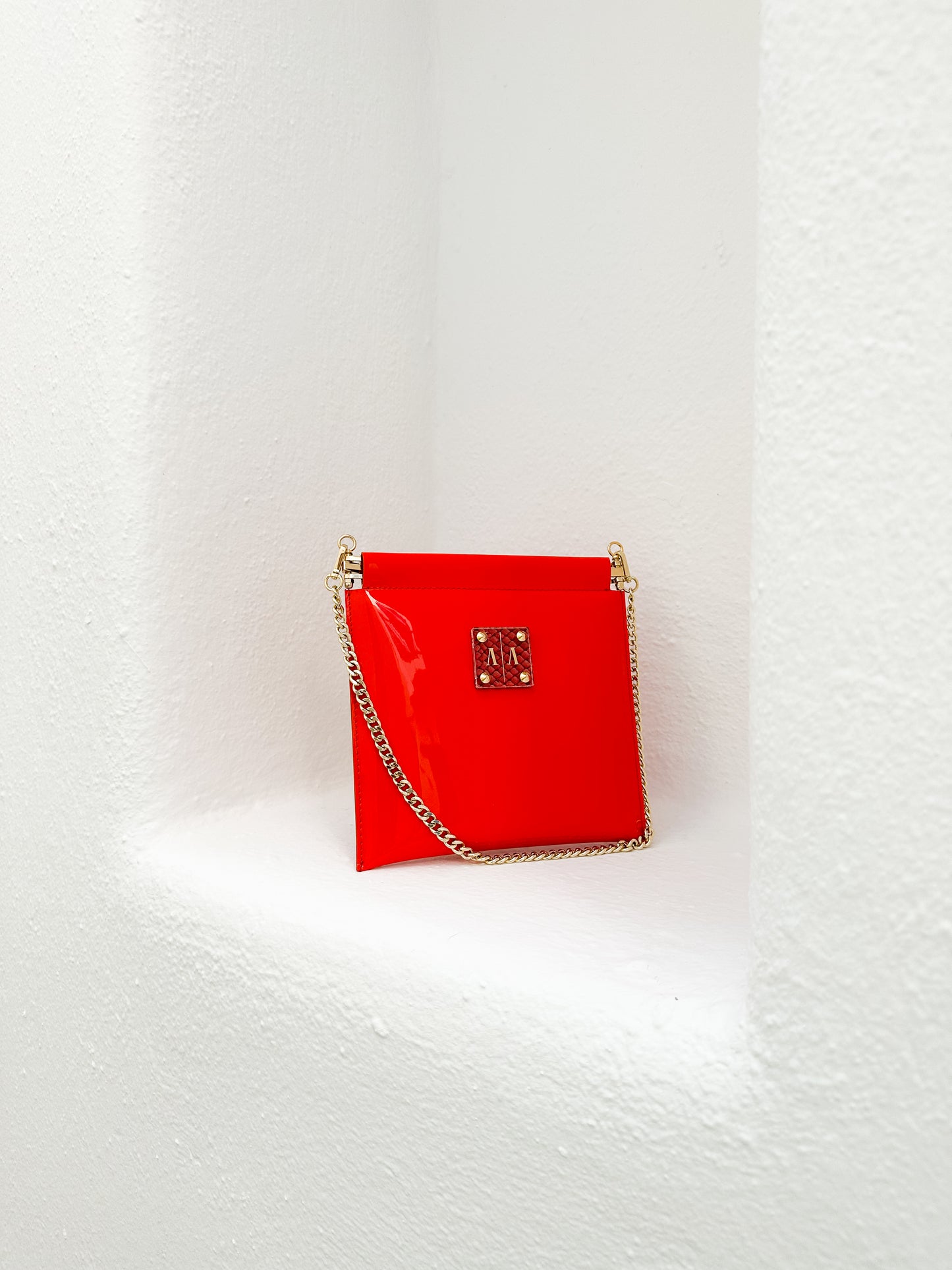 MARLENE “S” CLUTCH | VIBRANT ORANGE PATENT LEATHER